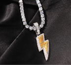 Necklace with a lightning bolt pendant on a black satin background, featuring the Uwin brand.