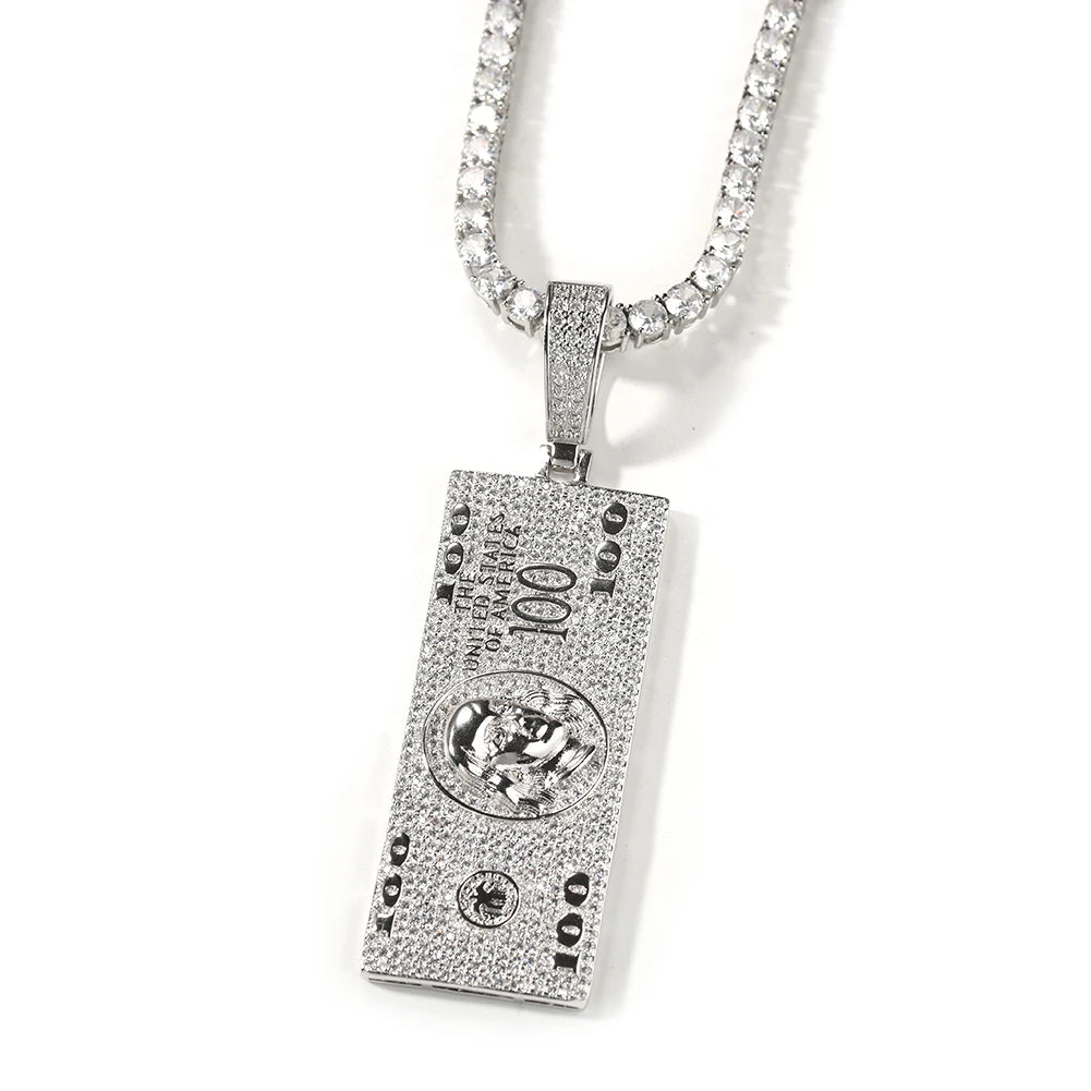 Gold pendant featuring a hundred dollar bill design from SOFT PARADISE, showing intricate bill details and a polished chain.