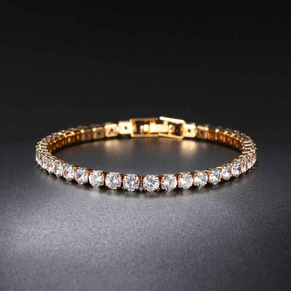 Iced out hip-hop tennis bracelet for men with cubic zirconia stones, worn on the hand, featuring a crystal chain design.