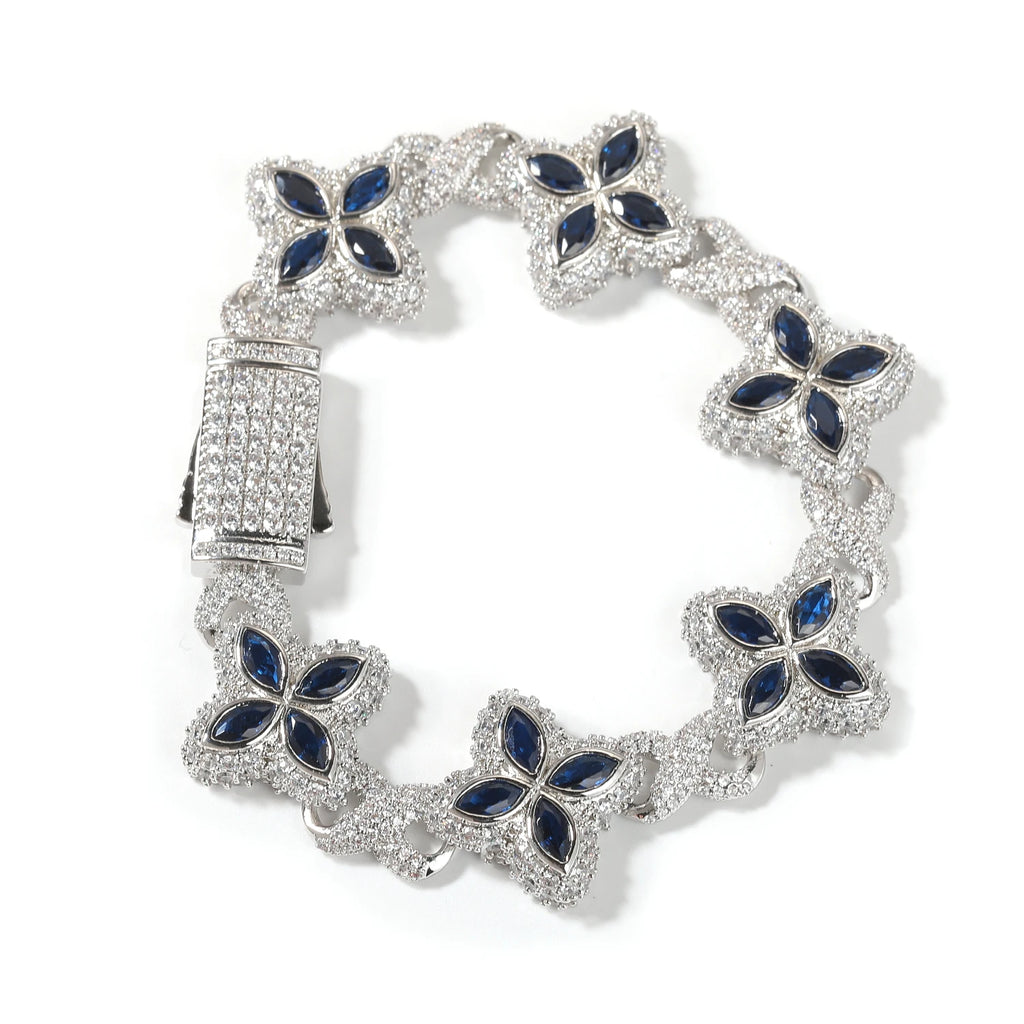 Baby Blue Baguette CZ Bracelet with blue flower-link segments set in pavé crystals on silver-tone metal.