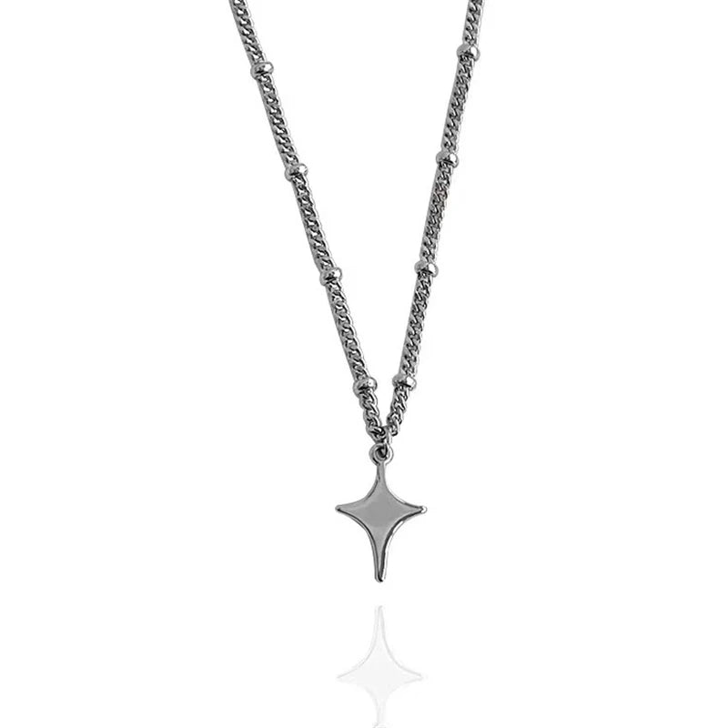 Gothic Star Pendant Necklace in silver with a bold chain.