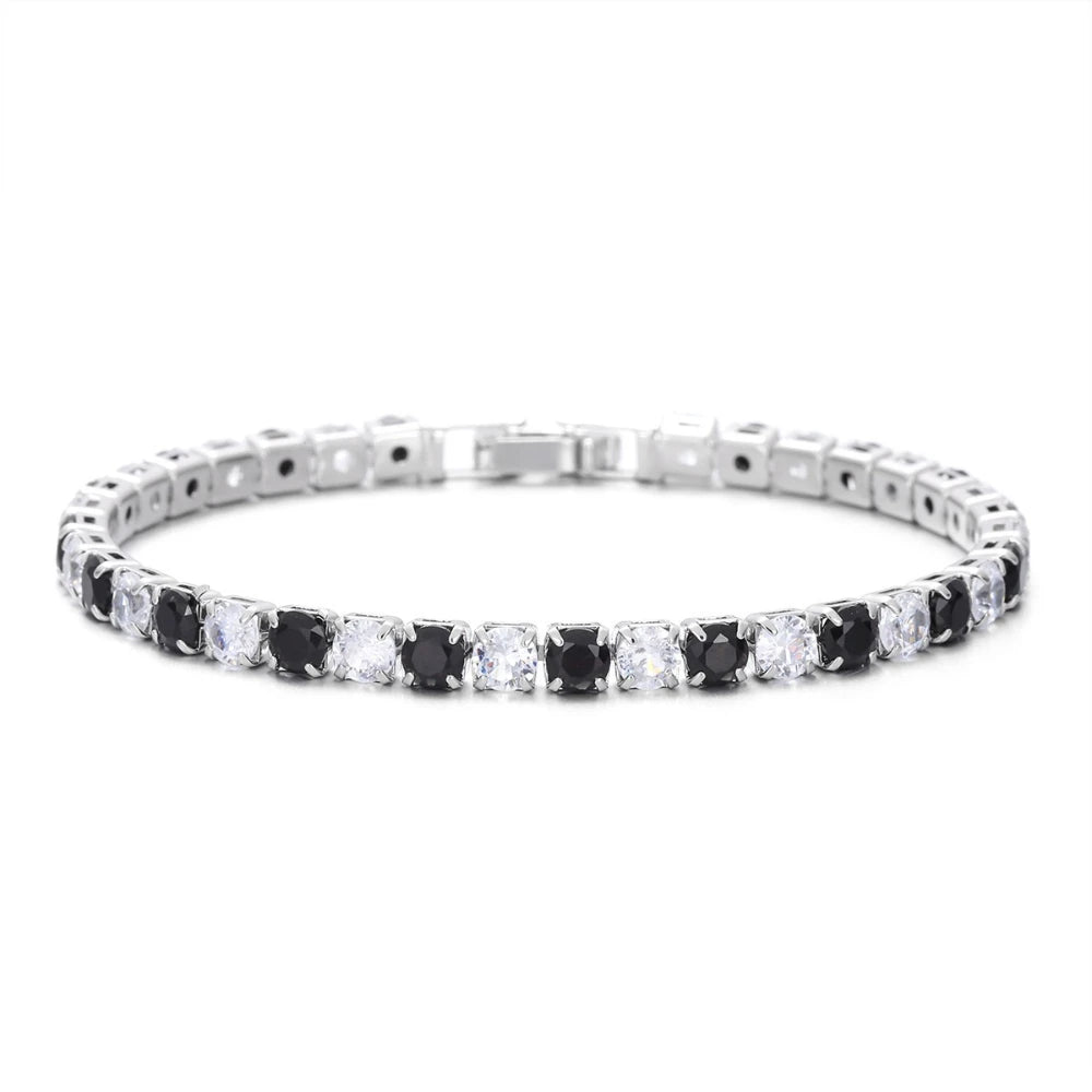 Black and white zircon tennis bracelet by SOFT PARADISE featuring sparkling stones on a sleek silver chain.