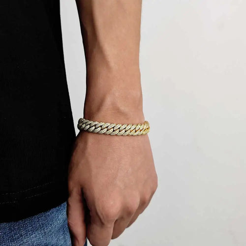 Soft Paradise 10mm Bubble Cuban bracelet featuring chunky, textured gold-tone links on a sleek jewelry display.
