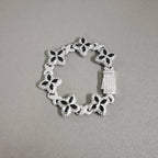 Baby Blue Baguette CZ Bracelet with silver-tone floral links and black accents