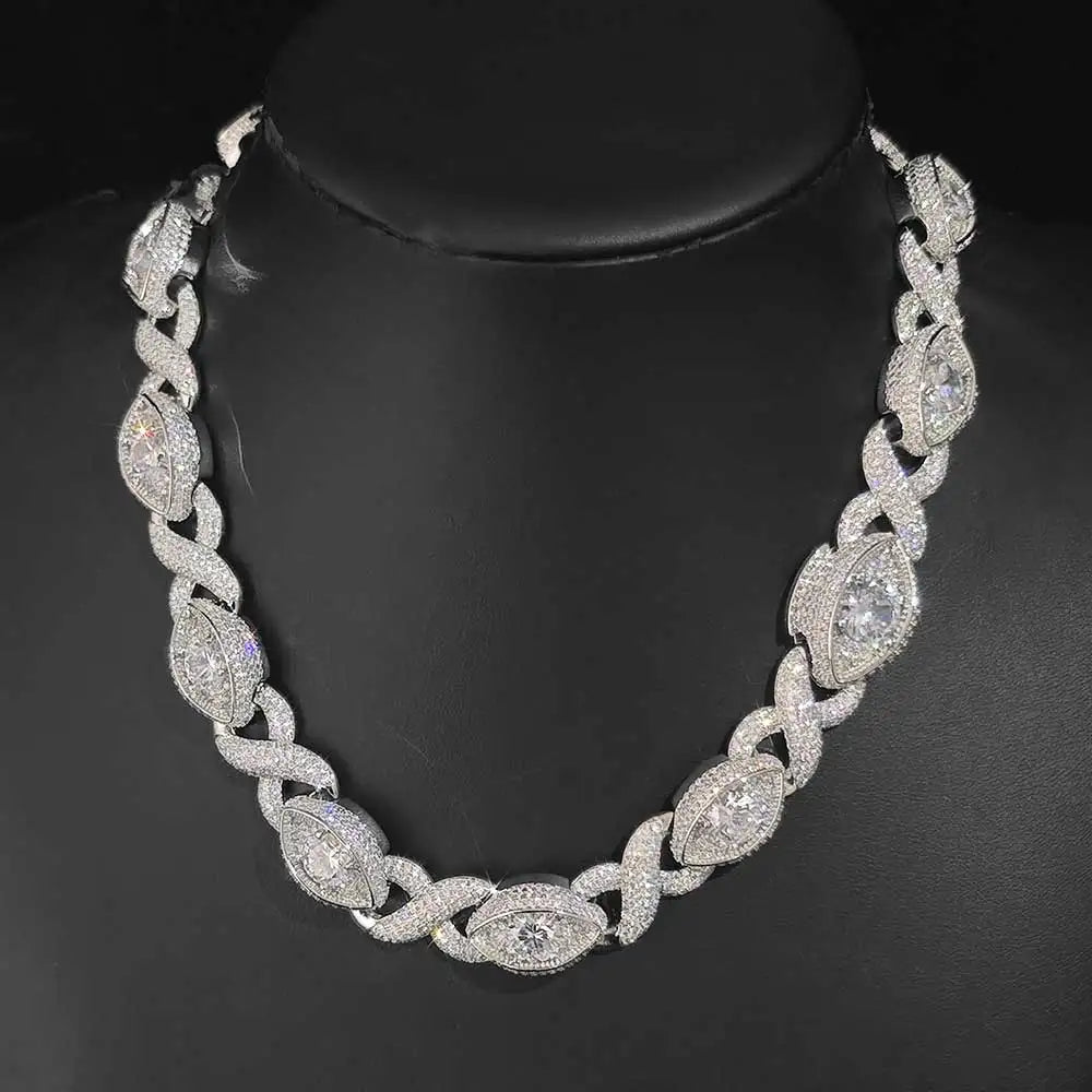 Soft Paradise gold filled diamond infinity link jewelry set with iced out CZ eyes, including bracelet and Cuban necklace, on black background.