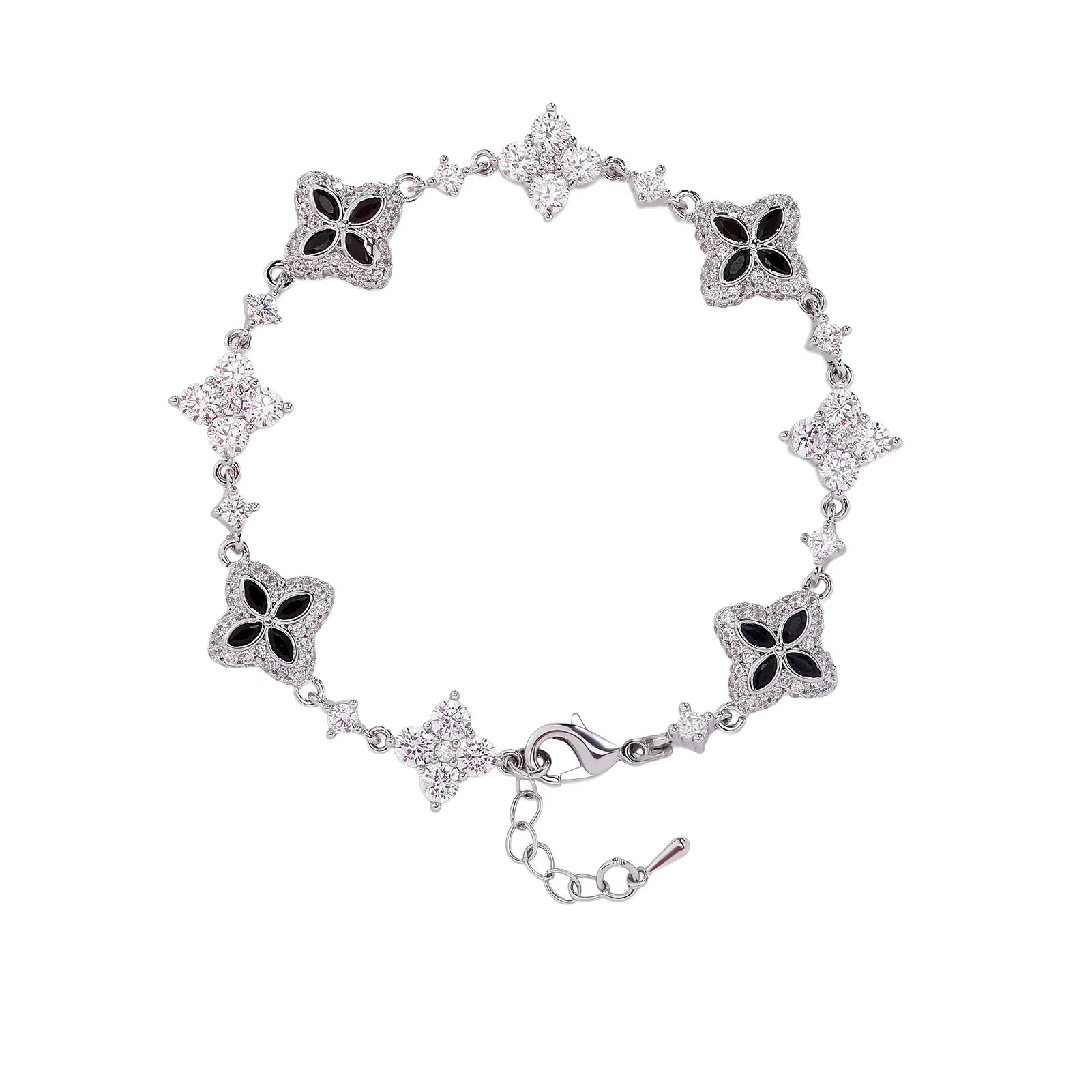 Four-Leaf Clover Bracelet in silver-tone metal with crystal-studded clover charms and an adjustable extender chain.