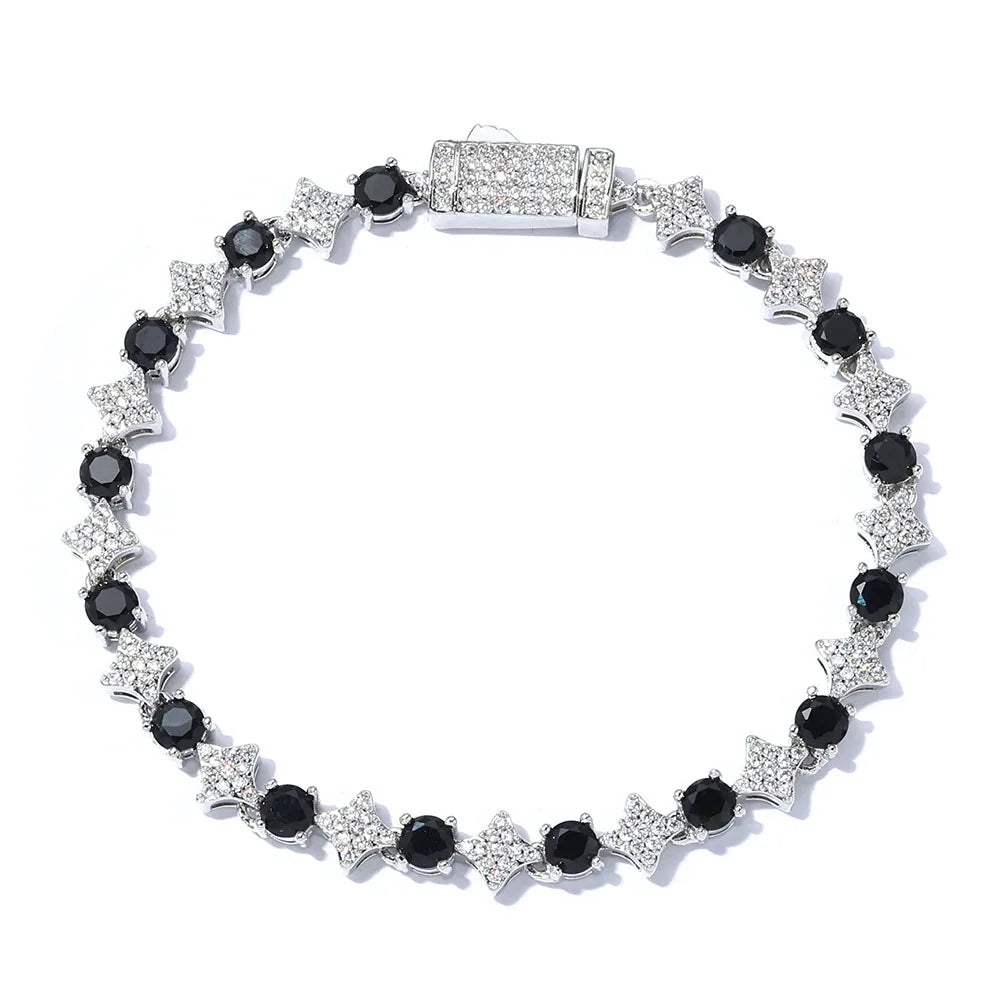 Star Tennis Bracelet by SOFT PARADISE featuring black and white zirconia stones on a delicate silver chain.