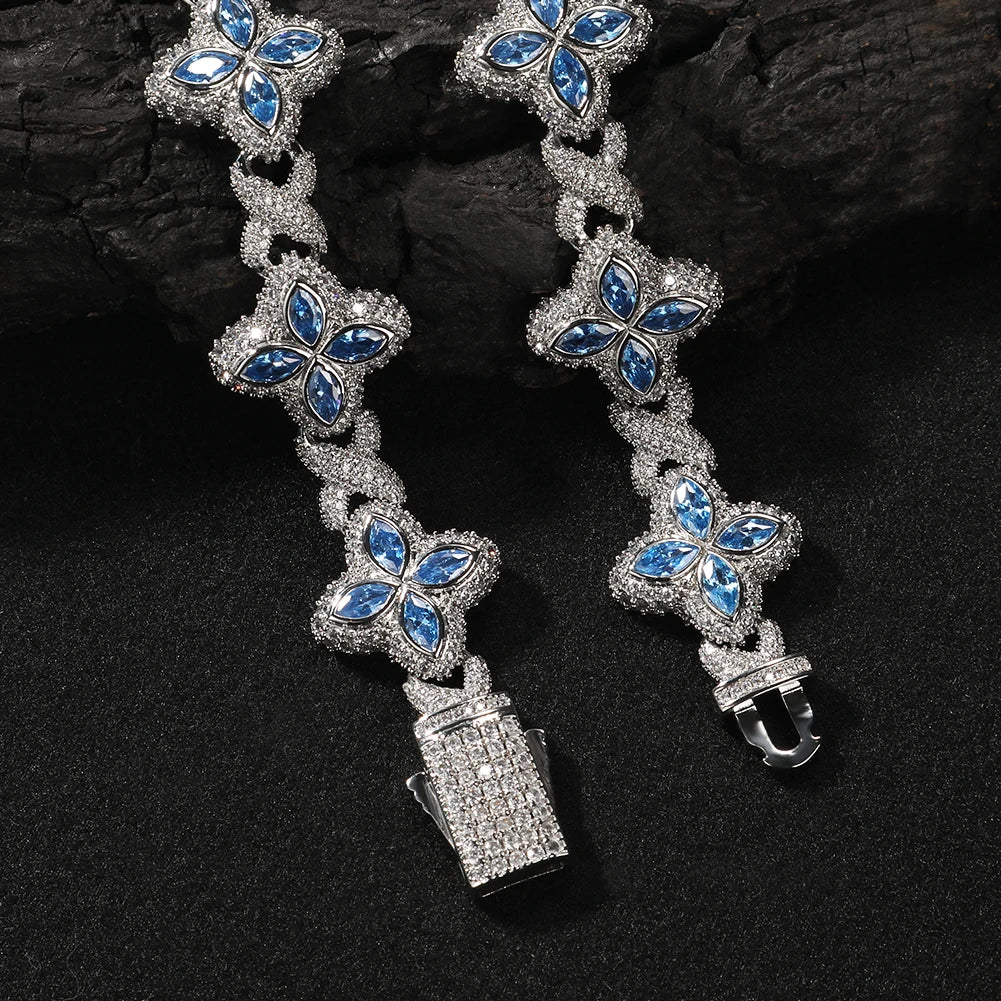 Baby Blue Baguette CZ Bracelet with silver-tone links and flower-shaped blue stone clusters.